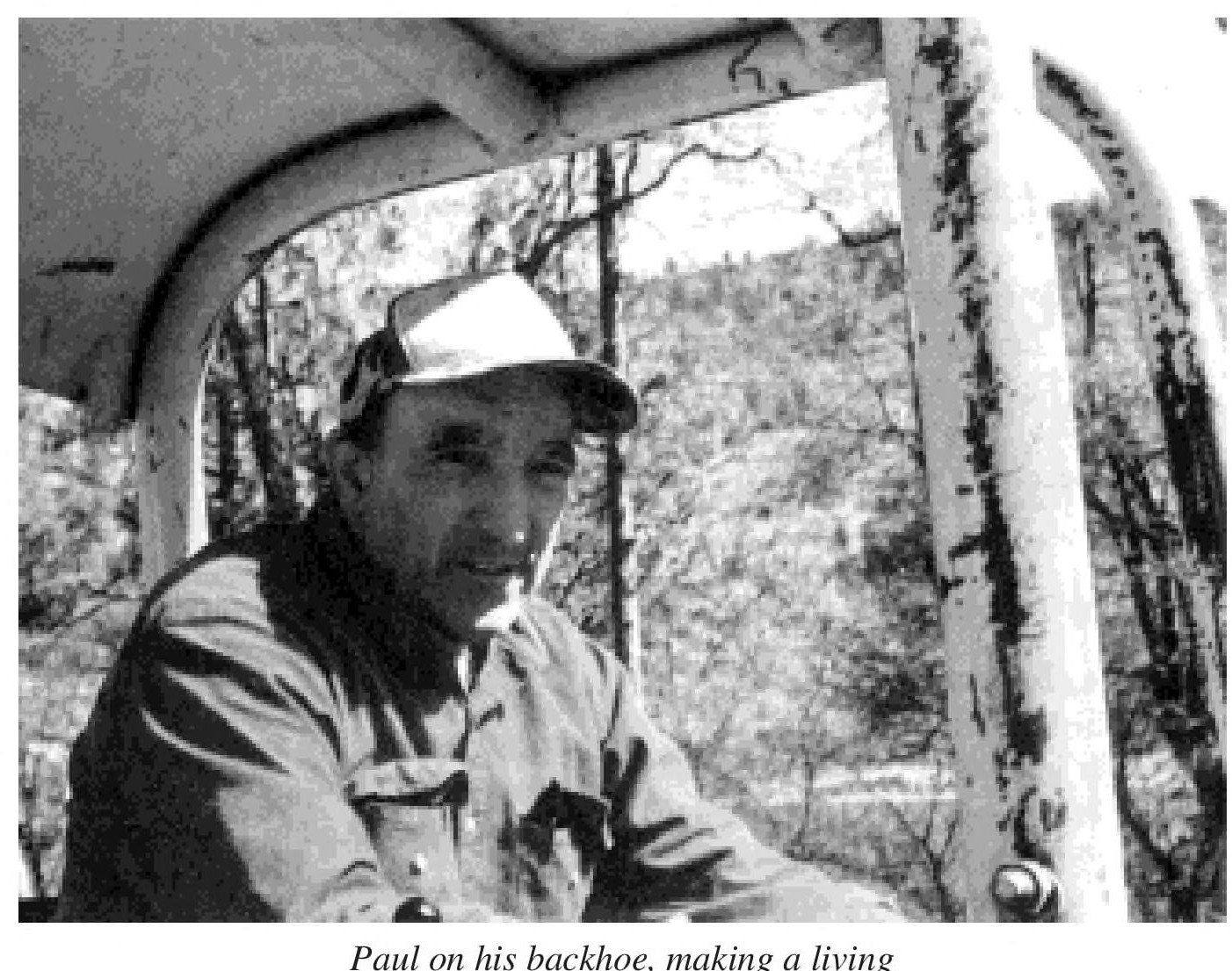 "Paul on his backhoe, making a living