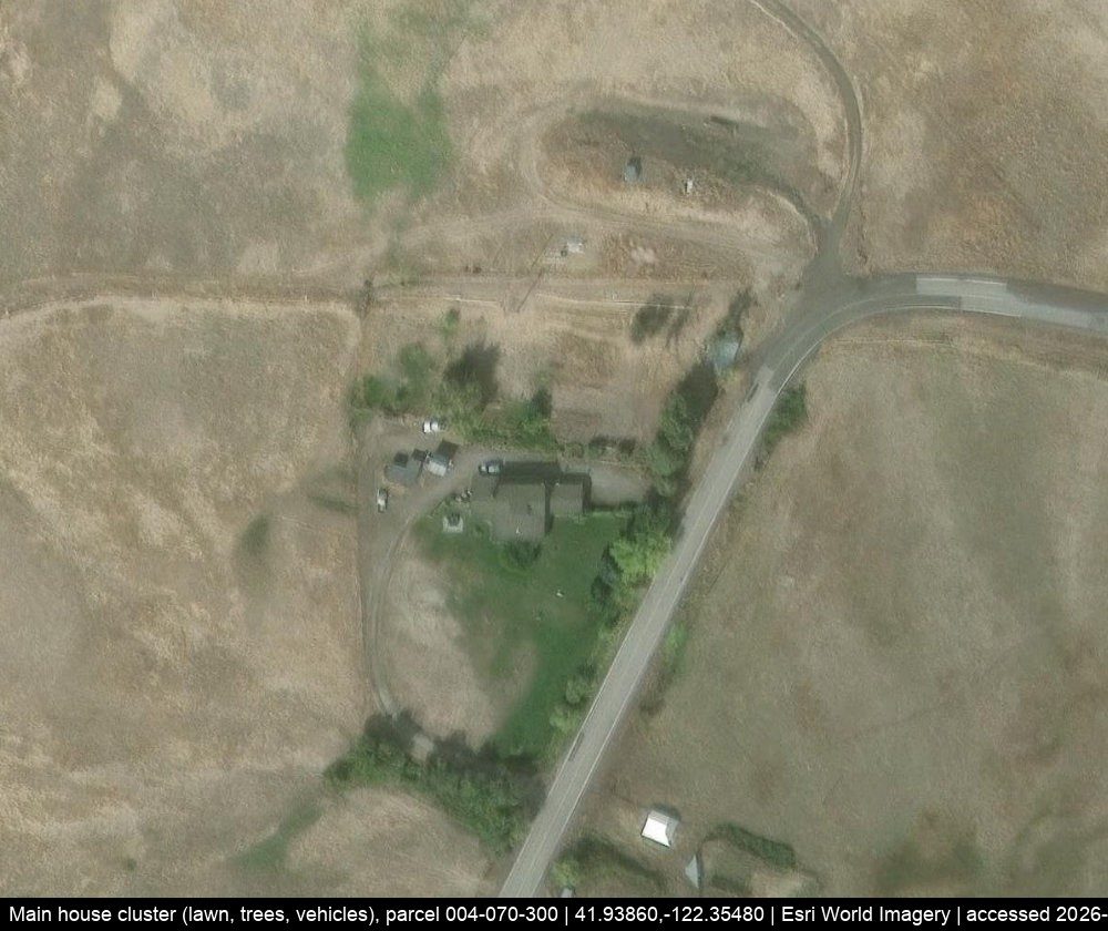 The house, yard and outbuildings from the air